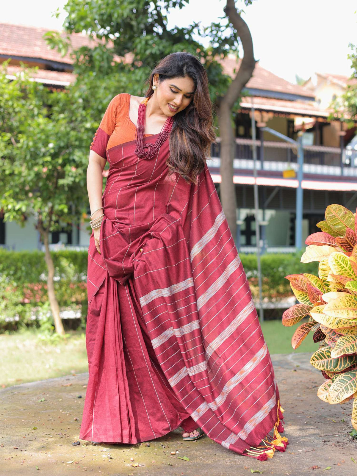 Durga cotton saree with contrast blouse.